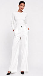 Pantalon Montaigne

Élégant et intemporel, le pantalon Montaigne incarne l’allure parisienne dans sa plus belle expression. Sa coupe droite et ample, structurée par deux pinces à l’avant, dessine une silhouette élancée tout en offrant un tombé fluide et impeccable.

Confectionné dans une matière composée de 87 % coton et 3 % élasthanne, il allie confort, tenue et liberté de mouvement. Sa taille haute est sublimée par un bouton signature exclusif Hind Kroussa Paris, véritable détail bijou qui souligne l’iden